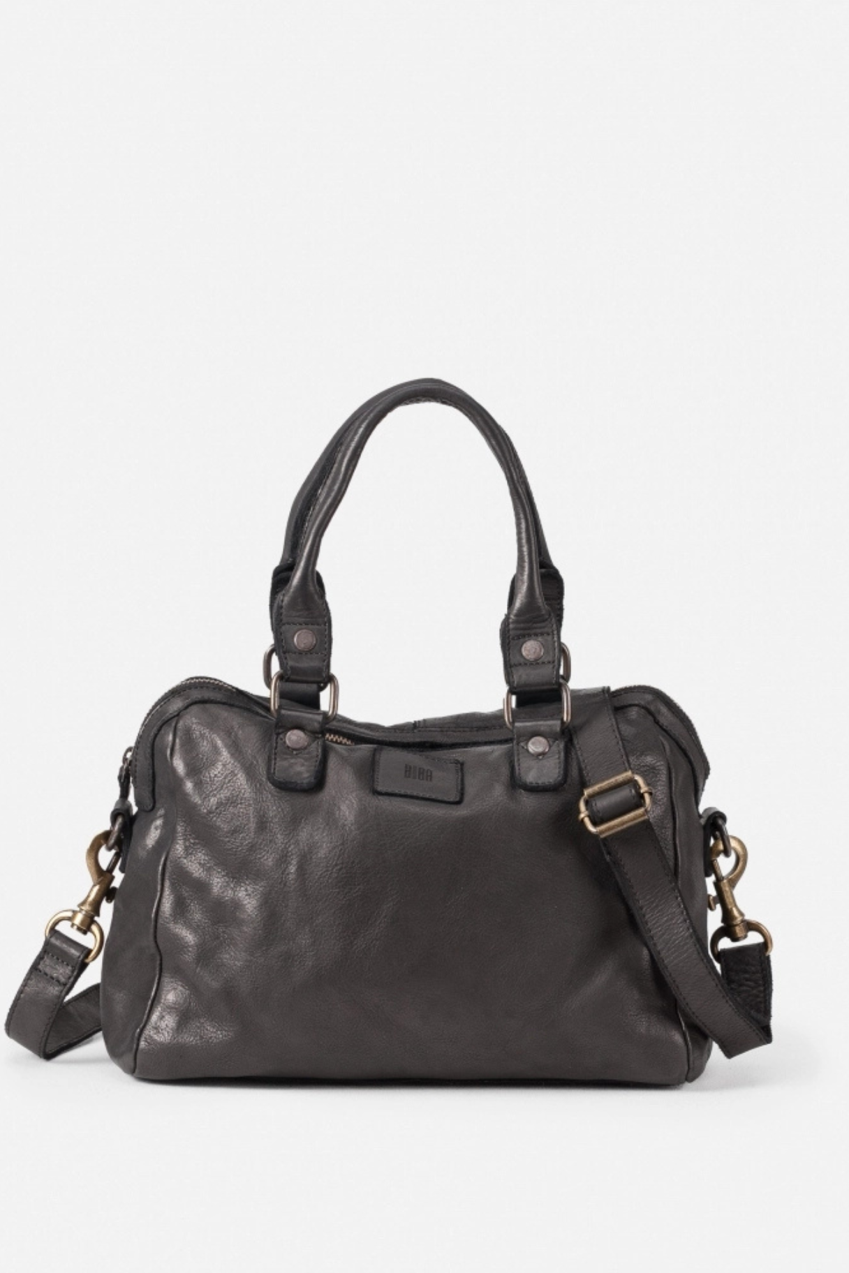 Sac bowling en cuir porté main, cuir tanné végétal