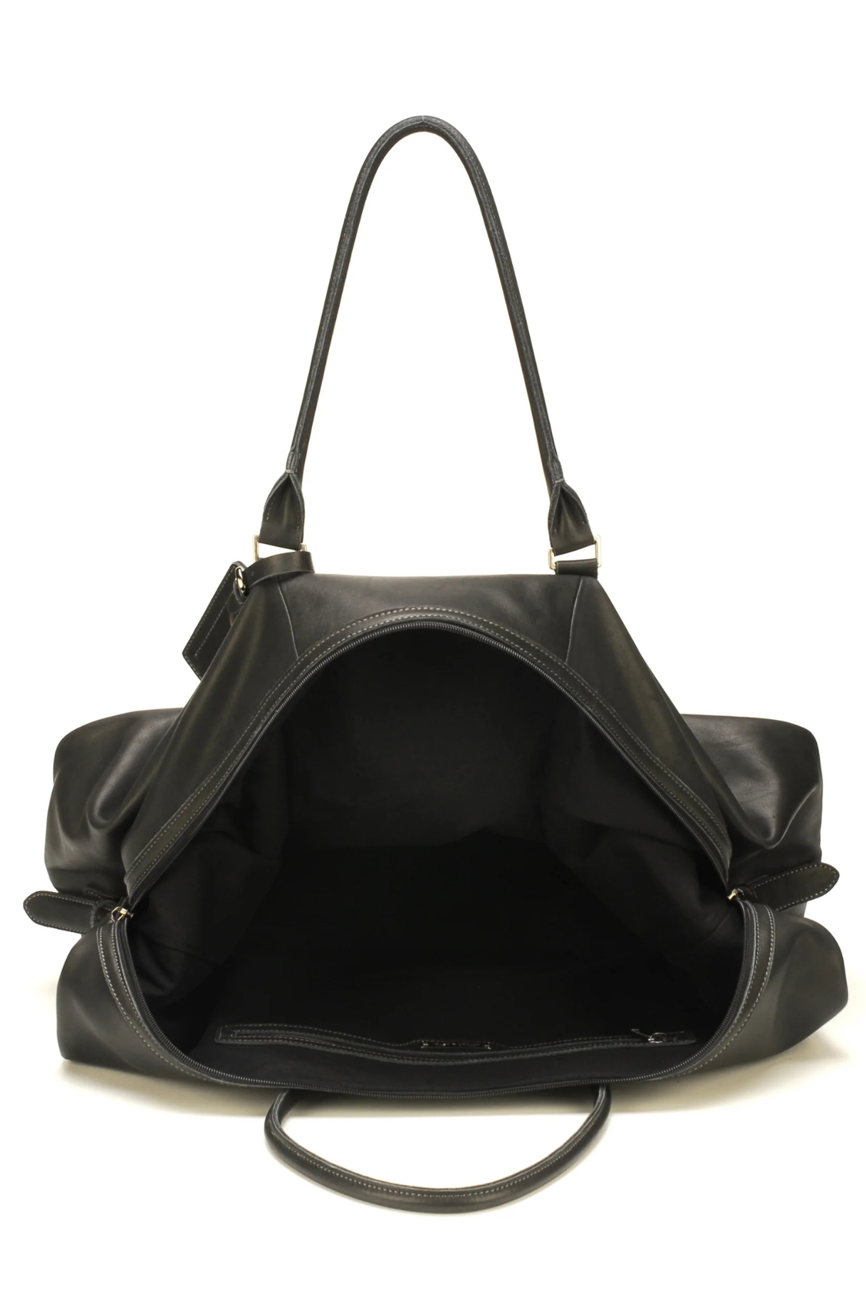 Intérieur du sac de voyage cuir Johany avec grand compartiment et poche zippée