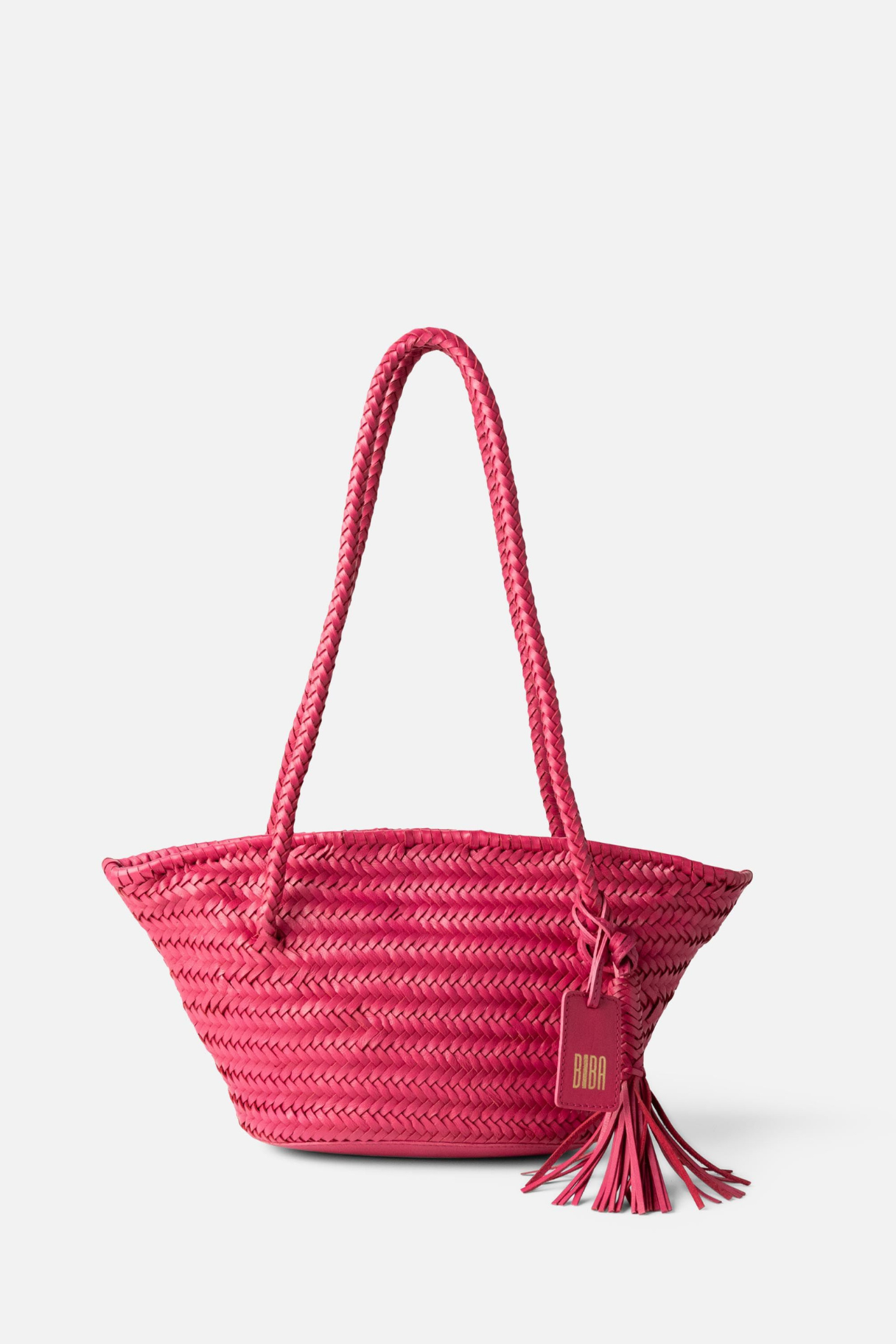 Panier BIBA en cuir tressé rose fuchsia avec anses tressées et pompon décoratif